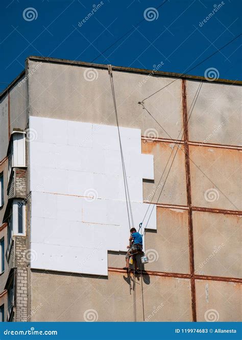 Insulation and Energy Saving Technology Concept. Worker Making B