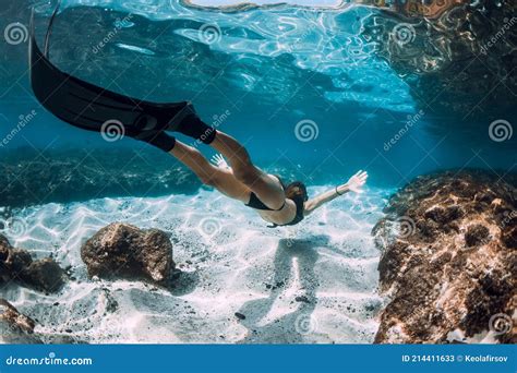 Freediving Underwater In Blue Ocean Sporty Woman Freediver Swim With