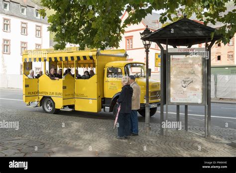 Bernkastel-Kues Burg Landshut Express yellow castle tourist bus, Germany Stock Photo - Alamy