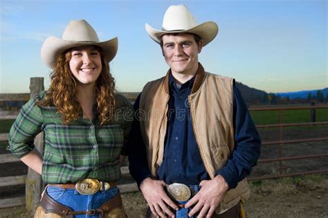 Cowgirl and cowboy couple stock photo. Image of woman - 14270252