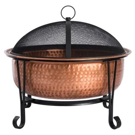 Take a shine to fireside chatting. This Hammered Copper Fire Pit with ...