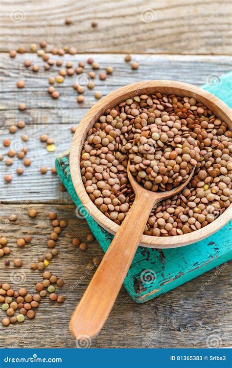 Raw Lentils In A Wooden Bowl And Spoon Stock Image Image Of Table