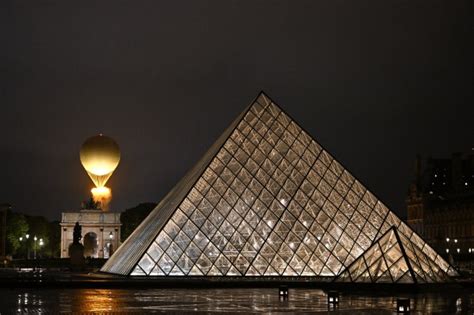 Olympics: Rain-soaked opening ceremonies can't dampen dazzle of Paris