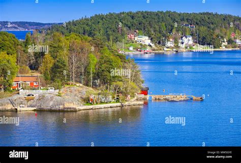 Rural Swedish Landscape With Coastal Villages Bright Wooden Houses And