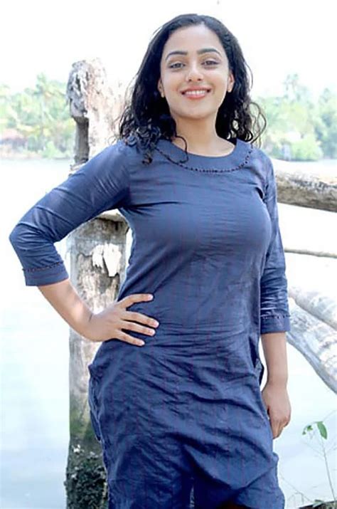 Stunning Hot Photos Of Nithya Menen Actress From Breahe Into The
