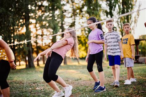 30 Kids Playing Limbo Stock Photos Pictures And Royalty Free Images