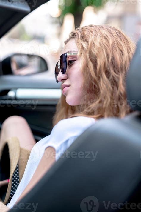 Attractive Blonde Caucasian Female Model Posing Outside Stock