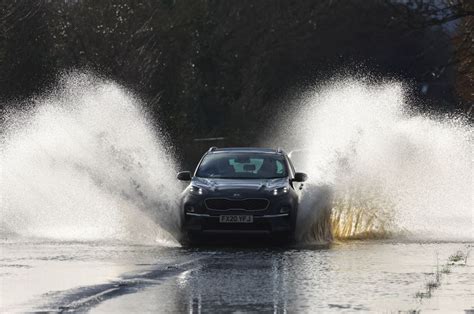 Britain Hit By Flooding After Heavy Rain Swells Major Rivers