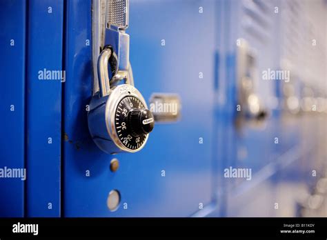 a Master Lock on a blue gym locker Stock Photo - Alamy