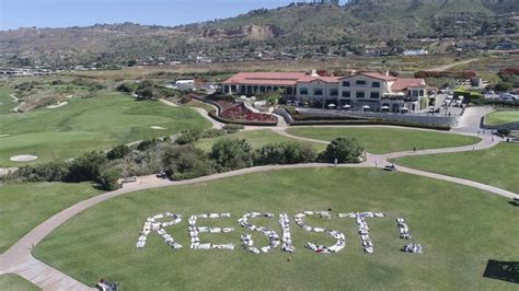 Protesters spell out ‘RESIST’ at Trump golf course