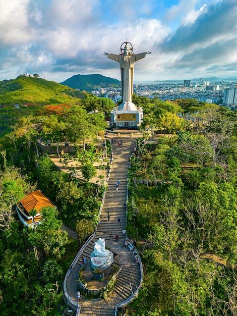 Premium Photo | Top view of Vung Tau with statue of Jesus Christ on ...