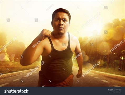 Fat Man Running Stock Photo 534193102 : Shutterstock