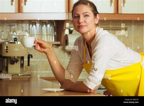 Pensive Mature Woman In Apron Hi Res Stock Photography And Images Alamy