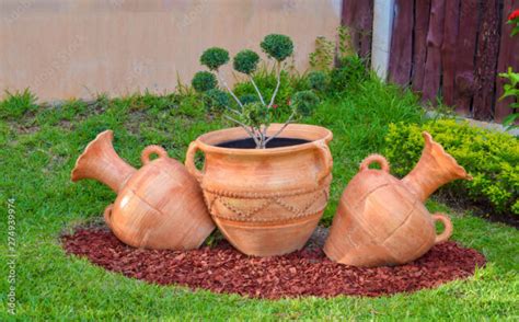 Jarrones de barro para jardin Plantasmanía