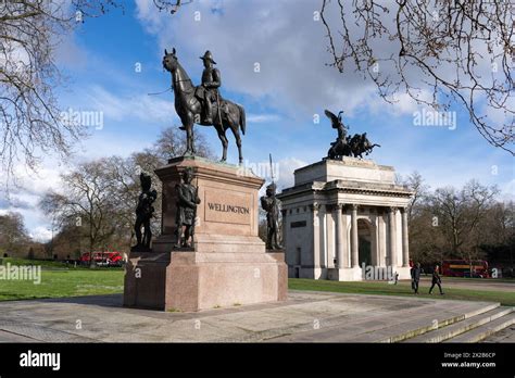 Bronze equestrian statue of the Duke of Wellington, and behind, the ...