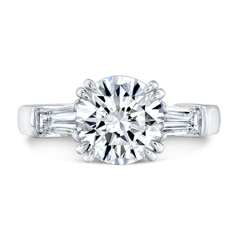 Round Brilliant Diamond Tapered Baguettes Engagement Ring In Platinum