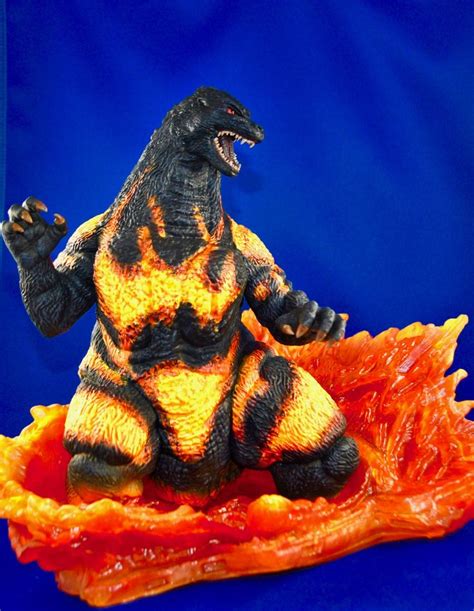 Fire Godzilla Toy On Orange Object