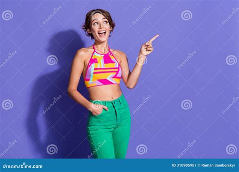 Photo Of Cheerful Glad Cute Girl Wear Trendy Clothes Demonstrate Empty