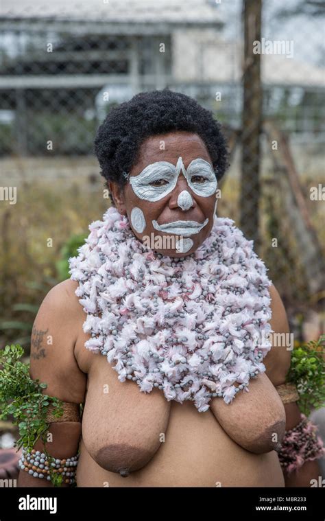 Half Naked Woman With Face Painting And Traditional Costume At Mount