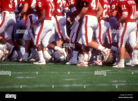 Football Players Wearing Red And White Uniforms Stock Photo Alamy