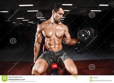 Handsome Power Athletic Man On Diet Training Pumping Up Muscles Stock