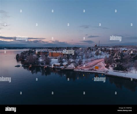 Early winter morning in the Stockholm archipelago at Rindö with snow on ...