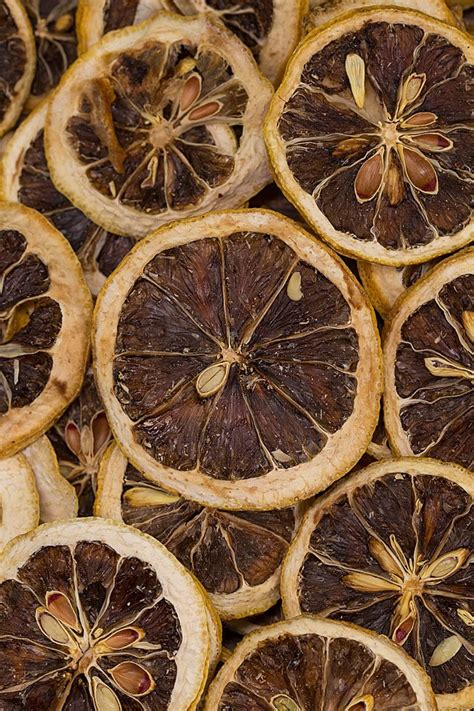 Vertical Shooting Of Dried Lemon Slices Background Dried Lemon Slices