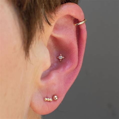 Body Piercer/Life Coach on Instagram: “Fresh rose gold and diamonds in a conch piercing from ...