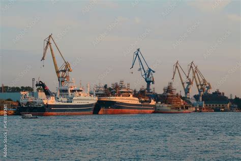 cargo ship in port Stock Photo | Adobe Stock