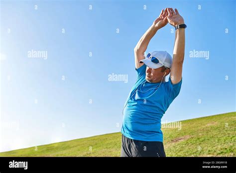 Mature Japanese Man Training Downtown Stock Photo Alamy