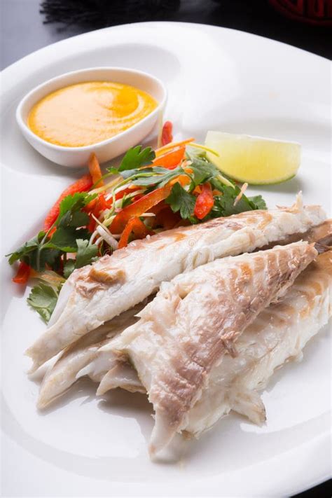 Baked White Fish Fillet Served with Steamed Rice Stock Photo - Image of ...