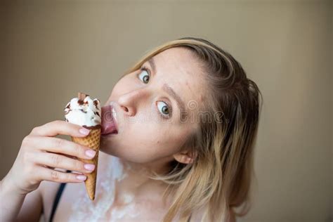 Blonde Licks A Waffle Cone Ice Cream Is Melting Erotically Draining Through The Body Of An