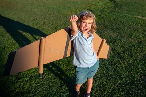 Kid Superhero With Jetpack Child Pilot Play On Summer Day Success