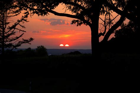 Two Suns In The Sunset, Photography by Dirk Dahlmann | Artmajeur