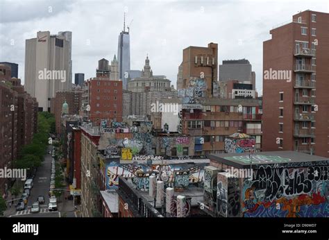 Rooftops covered with colorful graffiti near Manhattan Bridge, New York ...