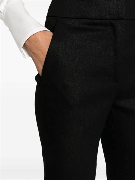 Genny Laminated Flared Trousers Black Farfetch