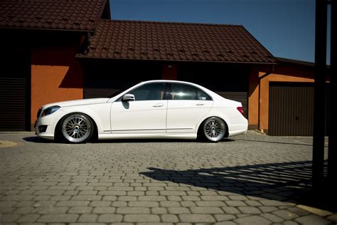 Baby Stylish Benz White C Class Ehanced with Custom Blacked Out Grille — CARiD.com Gallery