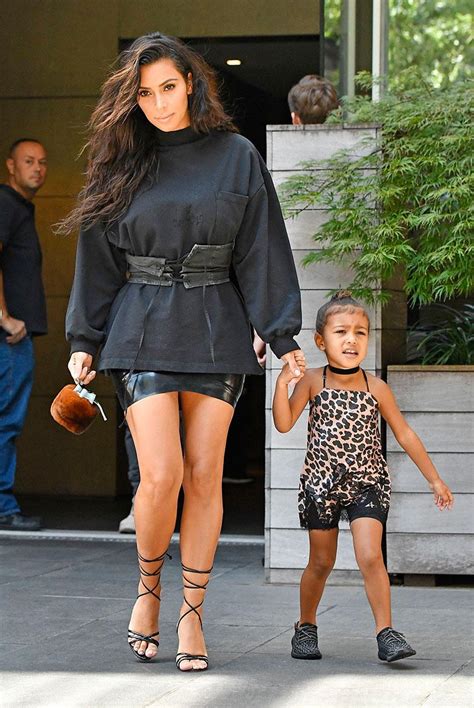 Kim’s Corset Busts Open On Movie Date With North