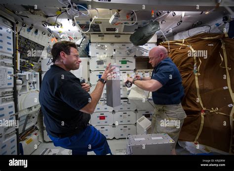 Sts 134 Greg Chamitoff And Mark Kelly On Endeavours Middeck Stock