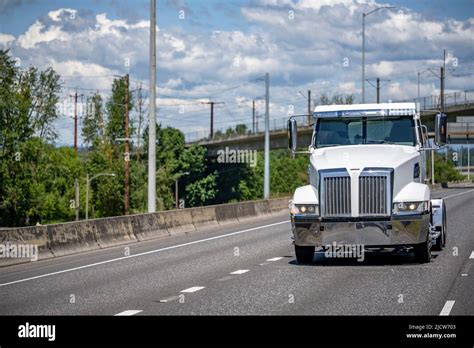 Powerful Clean Day Cab White Big Rig Bonnet Industrial Grade Semi Truck