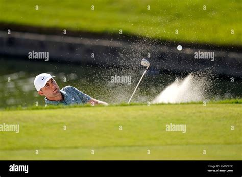 Scottie Scheffler Hits Out Of The Sand On The 18th Hole During In The Final Round Of The Charles