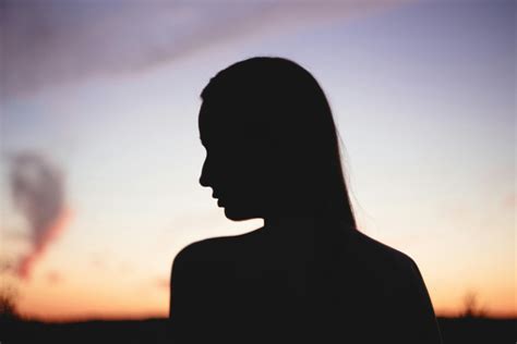 Silhouette of Woman during Sunset · Free Stock Photo