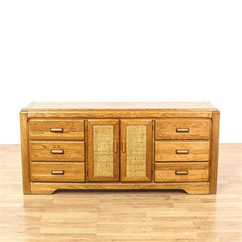 This Retro Dresser Is Featured In A Solid Wood With A Glossy Light Oak