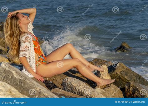 Lovely Blonde Bikini Model Posing Outdoors On A Caribbean Beach Stock Photo Image Of America