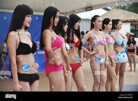 Bikini Dressed Contestants Pose During The First Round For The Central China Region Of The Miss