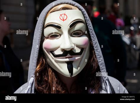 Woman wearing Guy Fawkes mask Stock Photo - Alamy