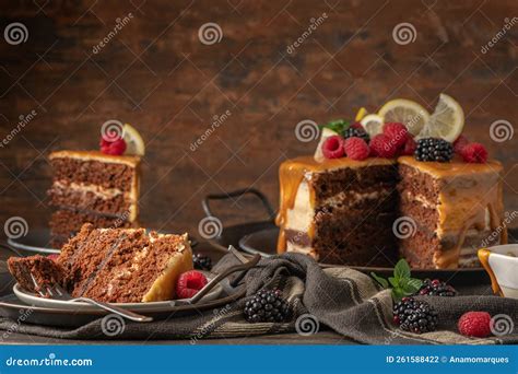 Delicious Semi Naked Chocolate Cake With Caramel Topping And Decorated With Blackberries And