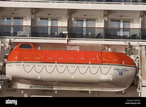 Queen Victoria 2 cruise ship life boat and cabins Stock Photo - Alamy