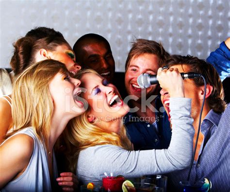 Group Of Young Cheerful People Singing Stock Photo Royalty Free