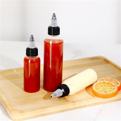 Clear 50ml 60ml 100ml boston round plastic sauce bottles wholesale